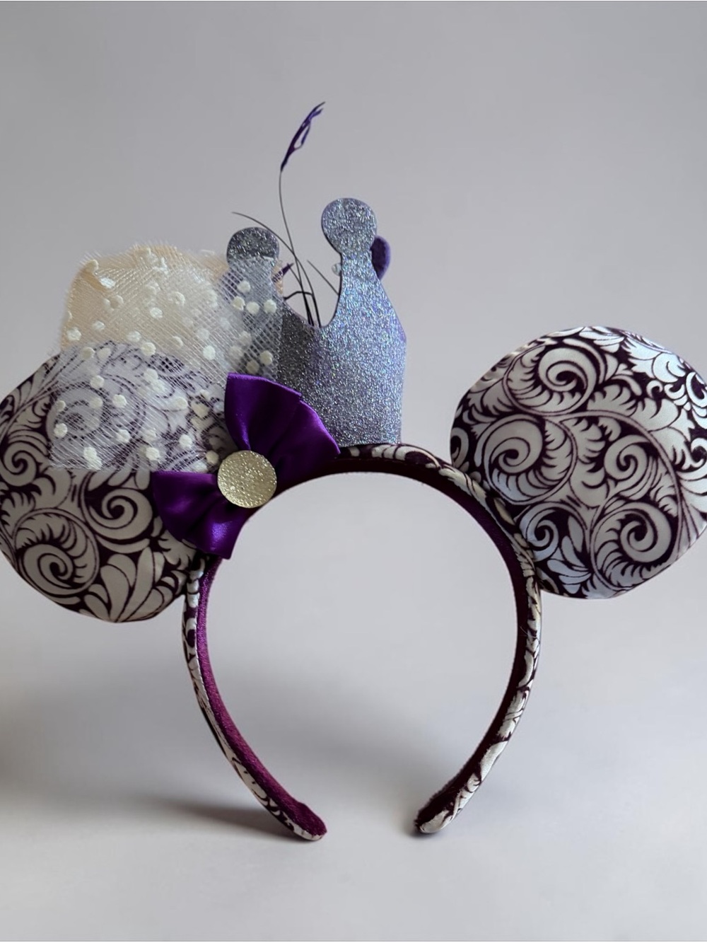 Disney parks Minnie Mouse glitter crown and feathers purple & white ear headband